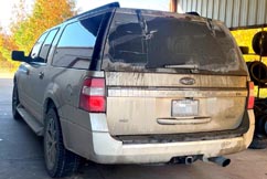 High Performance Pressure Washing  Beige Ford Expedition XLT Exterior Back Driver's Side Before Cleaning